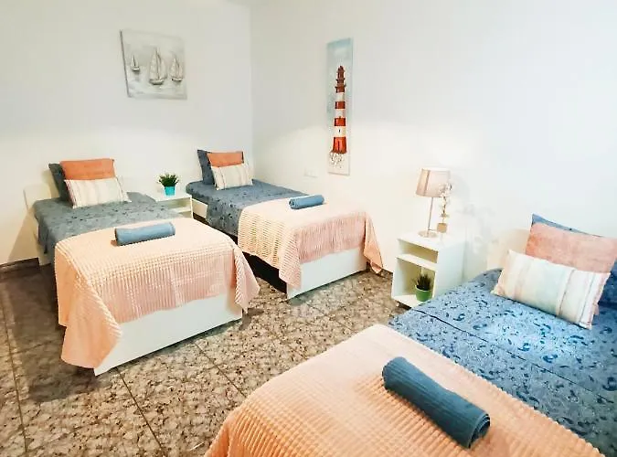 By Plaza Urquinaona Rooms