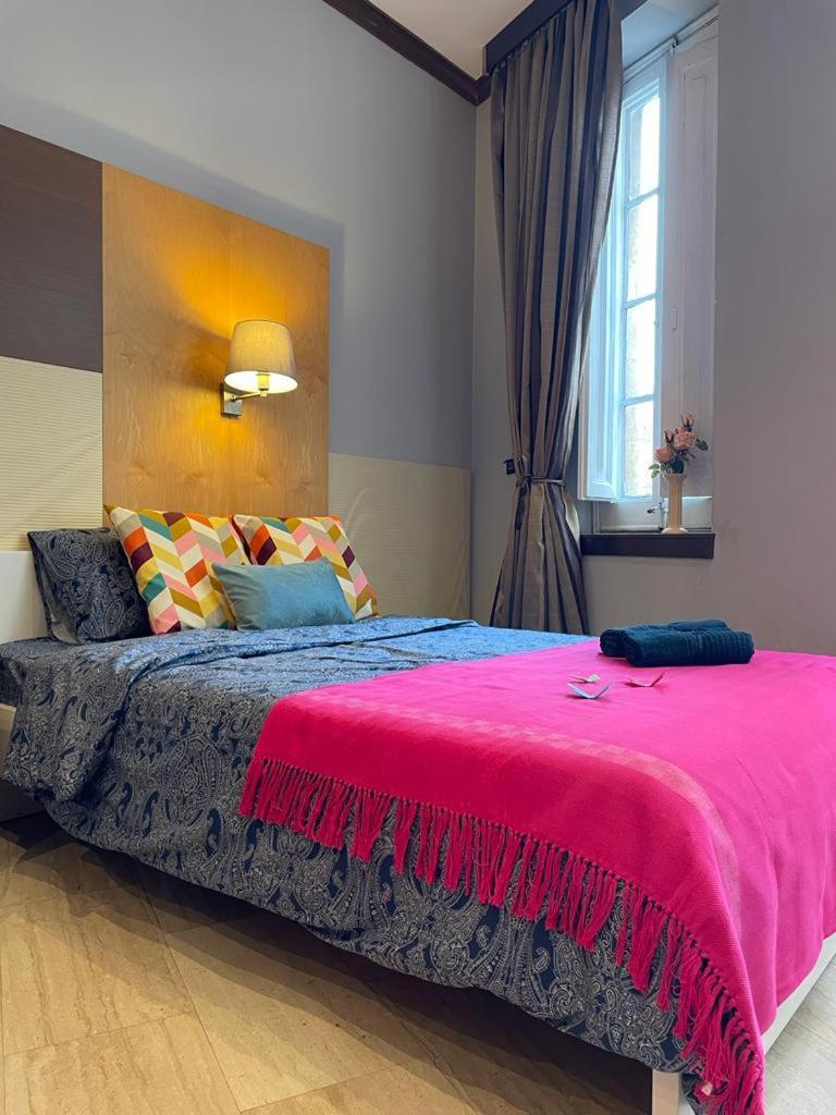 By La Rambla Rooms Hostel